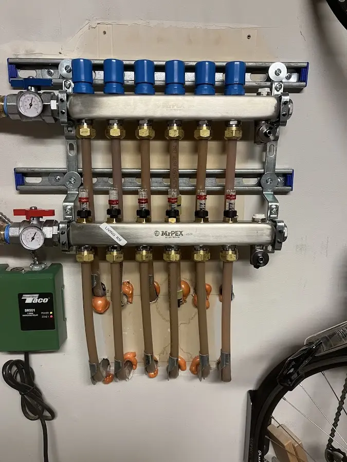 Plumber performing Water Heater Repair at a residential property in Landmark